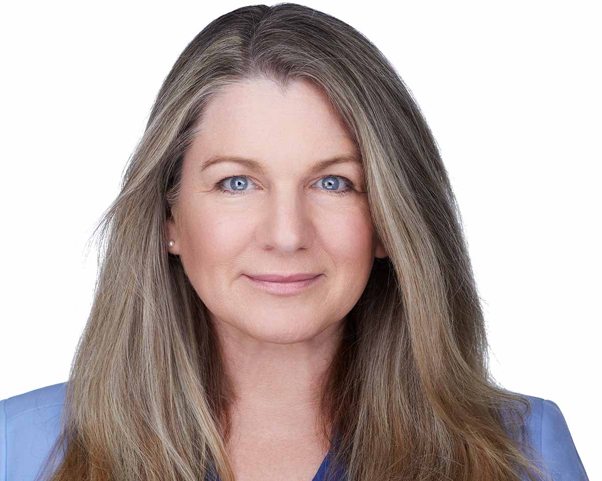 Female Executive Headshot with a blue jacket in Alexandria Virginia