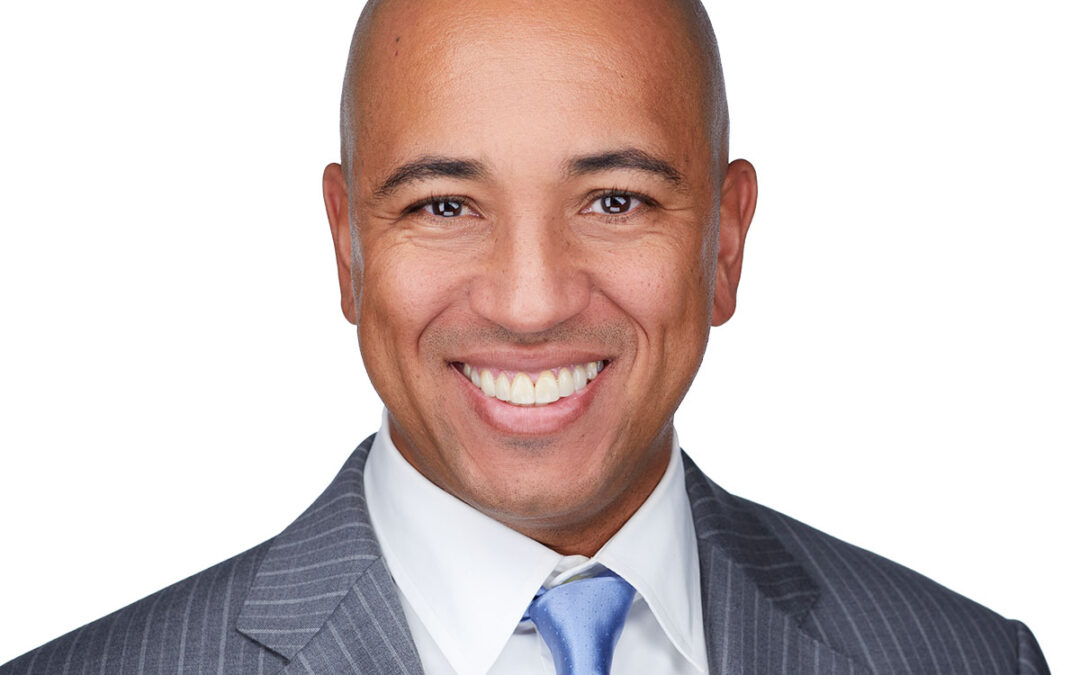 Black Male Executive in a gray jacket in Alexandria Virginia